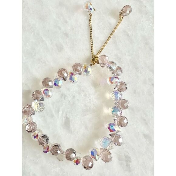 Purple and pink iridescent beaded friendship bracelet ￼ - Picture 1 of 5